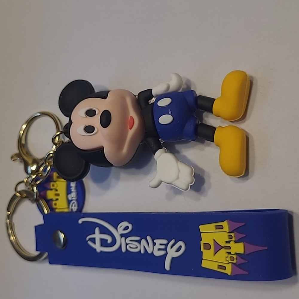 NWOT Mickey Mouse Keychain with Blue and Black Accents on a Blue wrist Strap.
